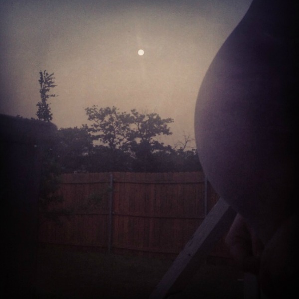 pregnant belly and supermoon